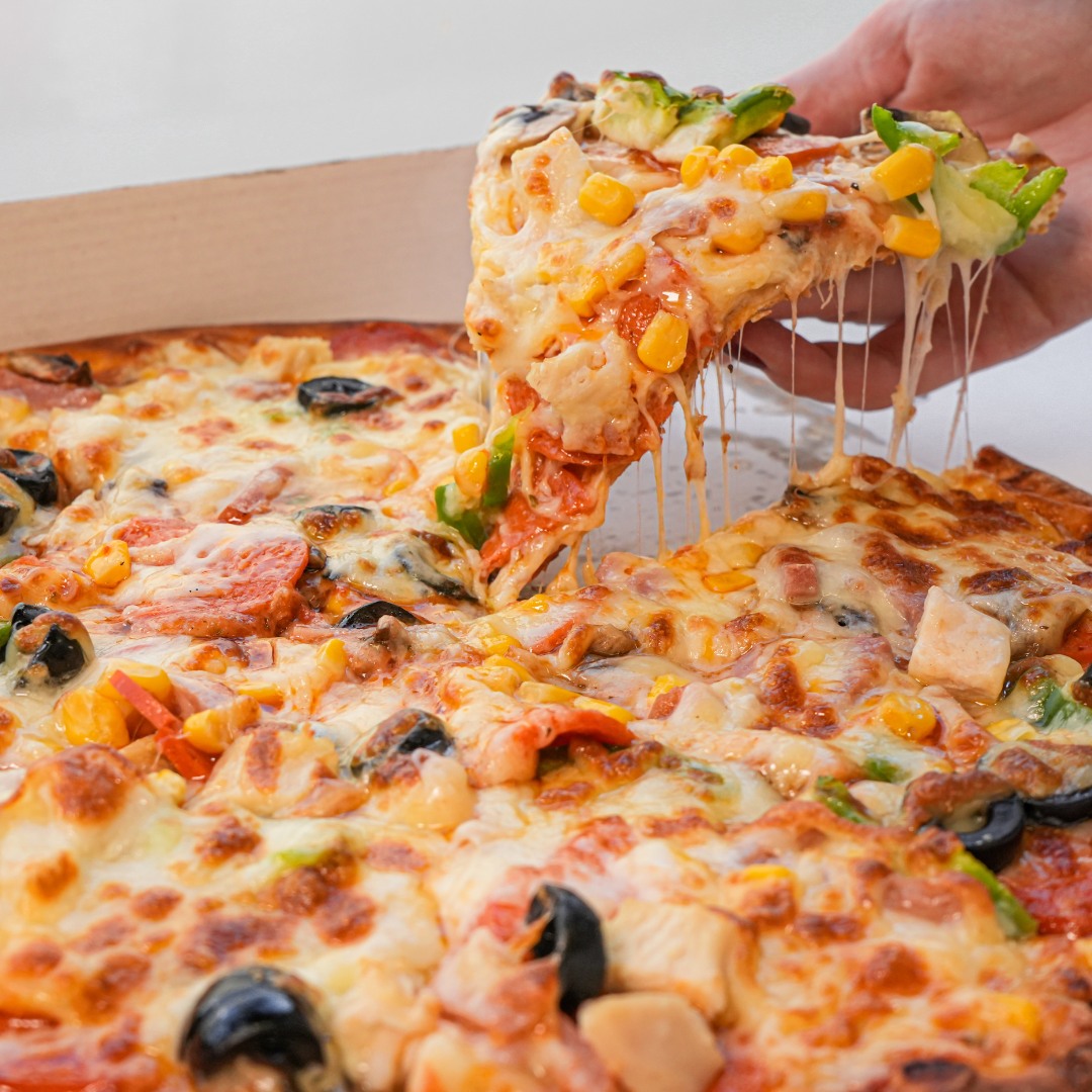 Fresh, Cheesy Pizza Baked to Perfection served in Papa Jaffer's, Edinburgh.